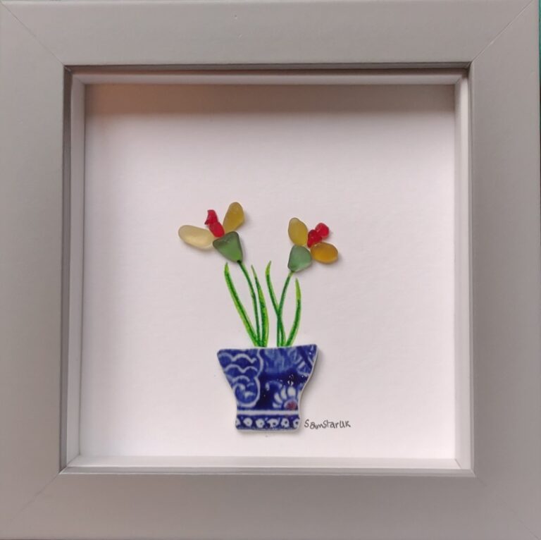 Handmade flower artwork from colorful sea glass
